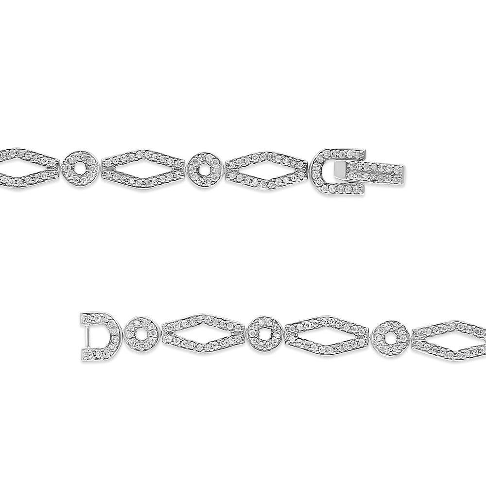 Top-down view of two white metal bracelets featuring alternating open oval and circular links, each set with round white gemstones in prong settings.