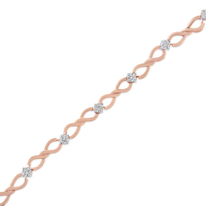 Diagonal top-down view of a rose metal bracelet with alternating twisted links and clusters of round white gemstones in pave setting.