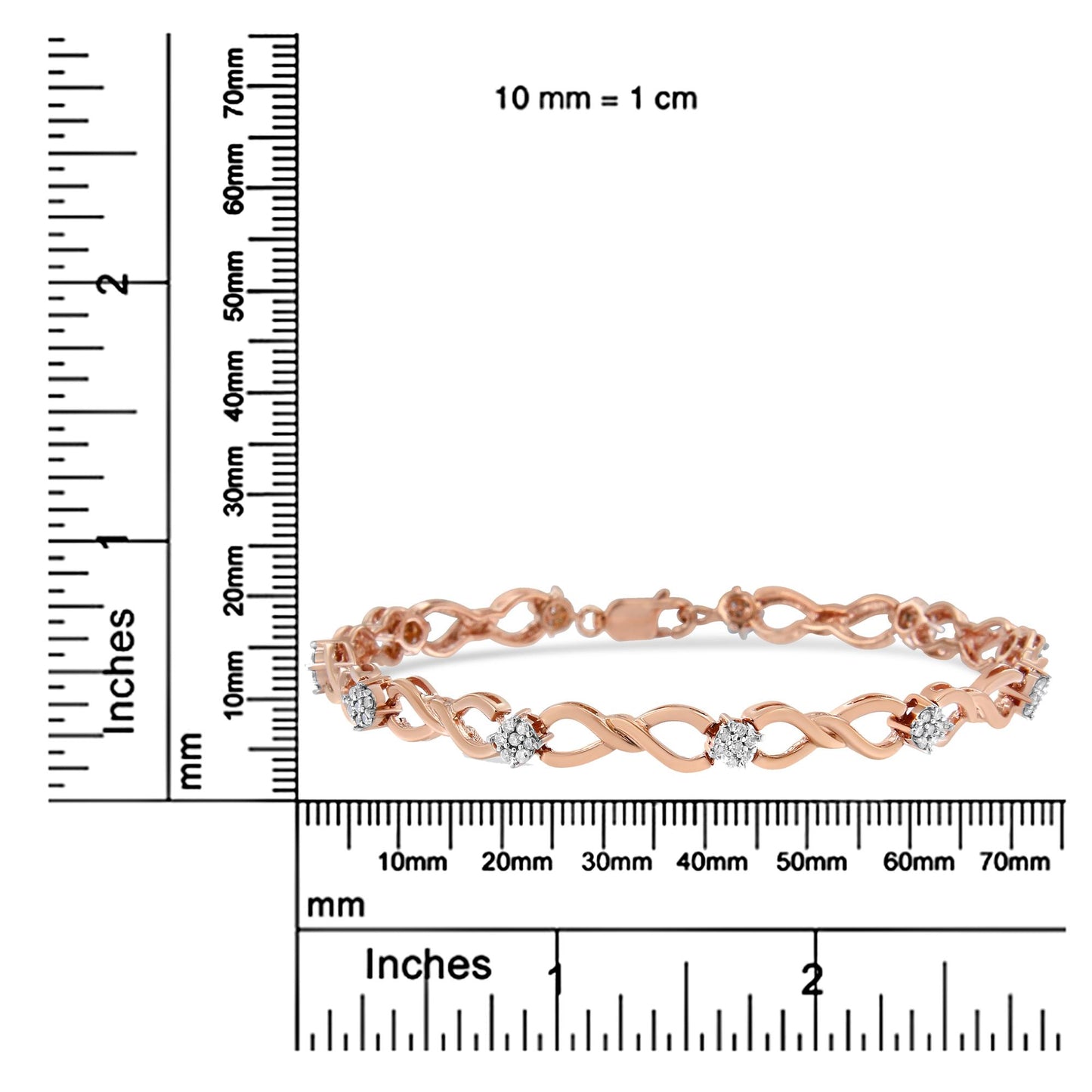 Rose metal bracelet with round white gemstones in pave setting, displayed flat on a ruler for size reference, front angle shot.
