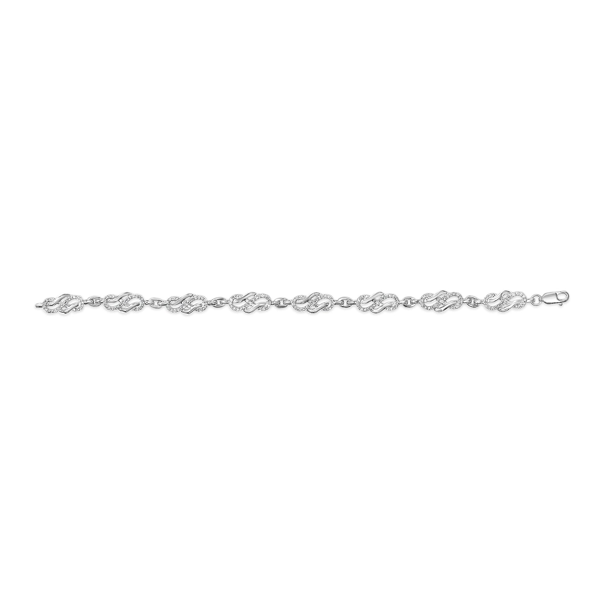 White metal bracelet with linked oval-shaped sections featuring round white gemstones in pave setting, shown flat against a white background from a top-down angle.