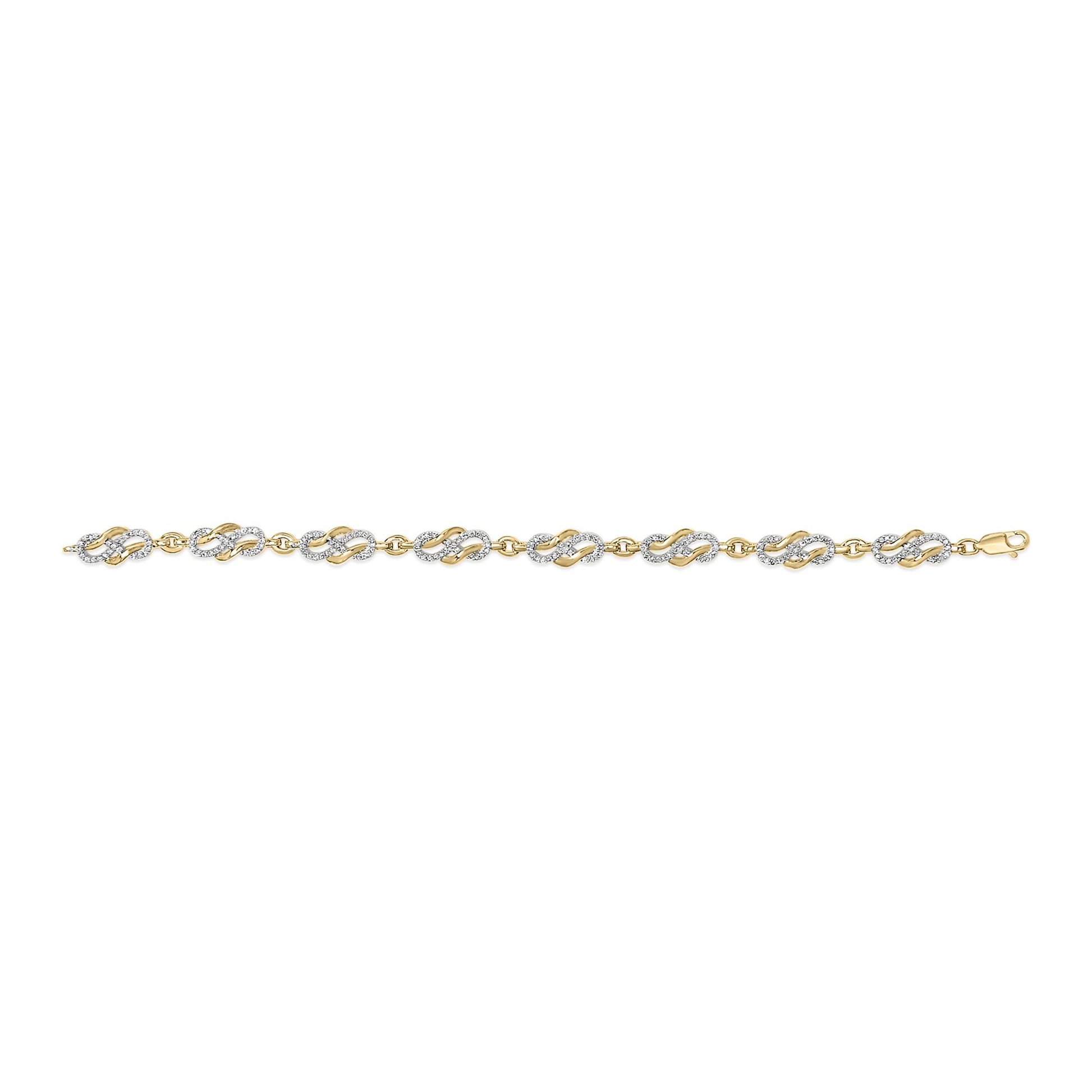 Yellow bracelet with linked oval and curved shapes, some set with white round pave gemstones, shown in a top-down flat lay angle.