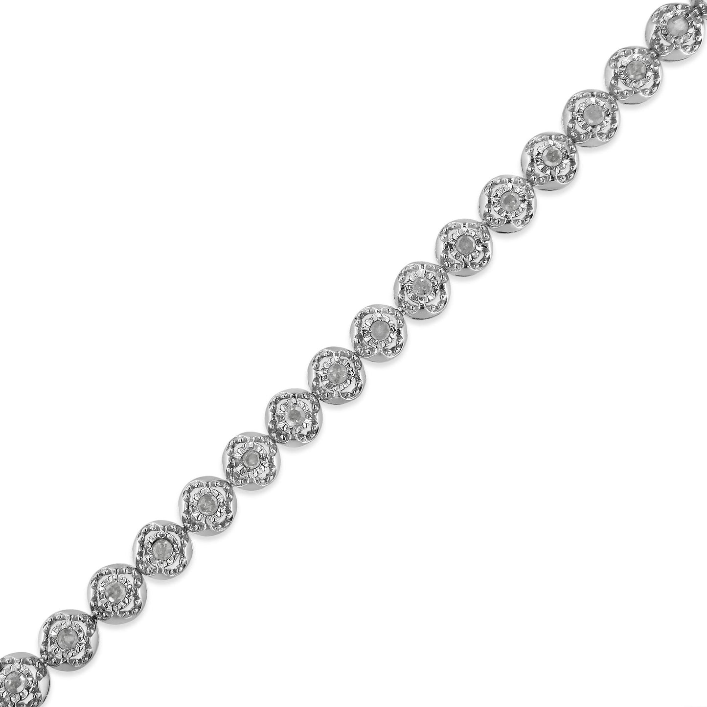 Diagonal close-up top view of a white metal bracelet featuring round-shaped white gemstones in prong settings arranged in a linked pattern.