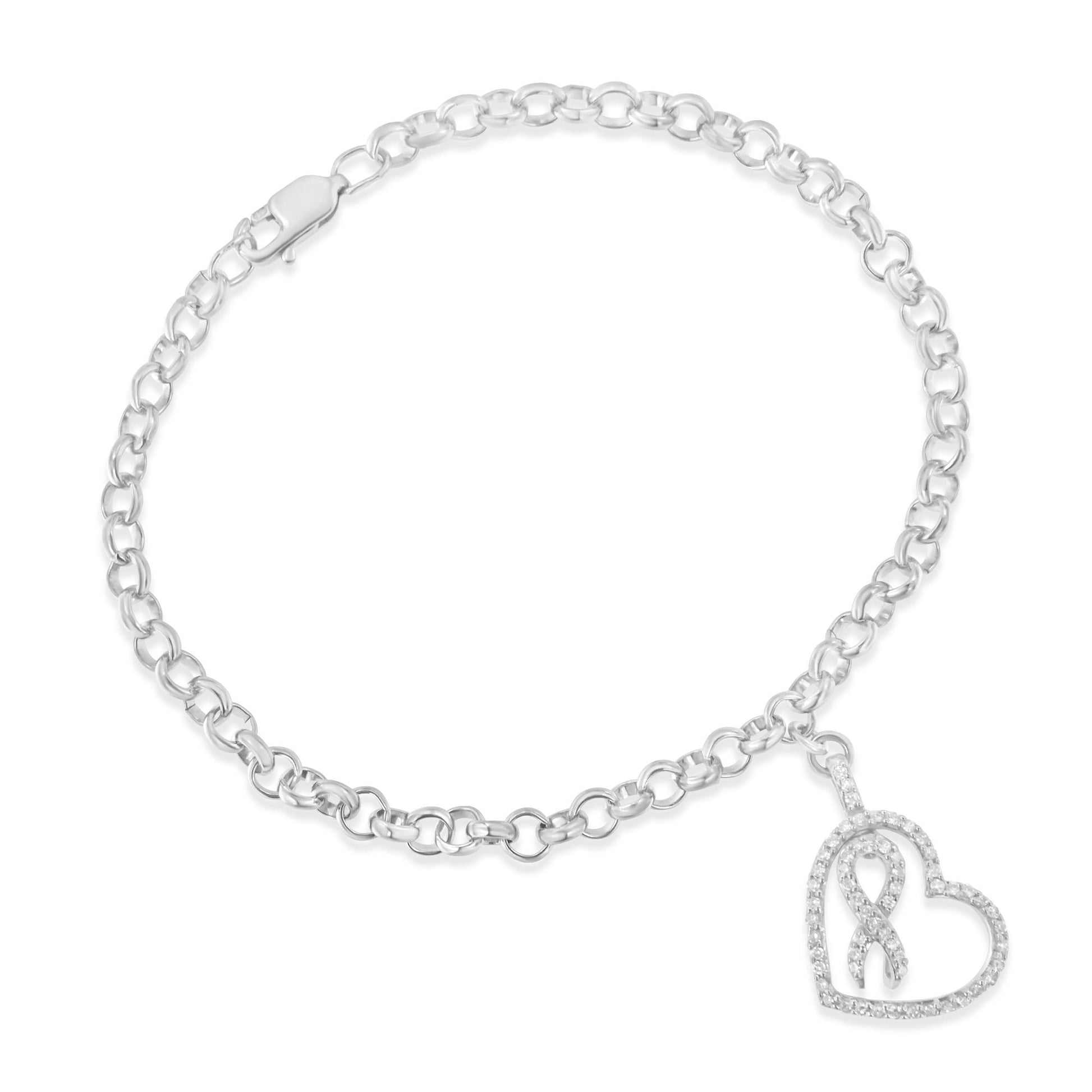 White metal bracelet with a chain link design and a heart-shaped charm adorned with round white gemstones, shown in a top-down angle.