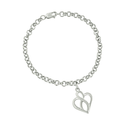 White metal bracelet with chain links and a heart-shaped pendant, shown from a top-down angle.