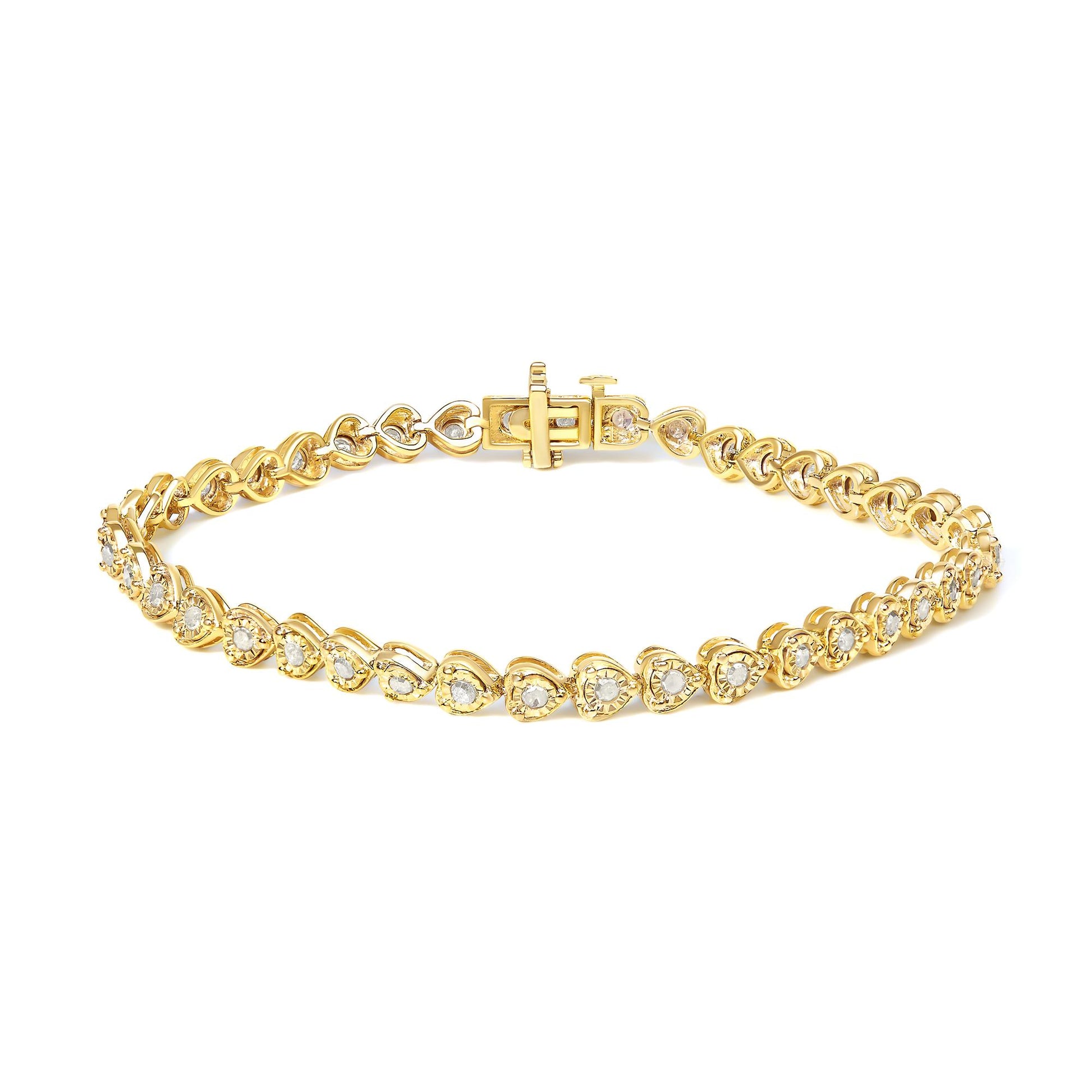 Yellow metal bracelet with round white gemstones in a miracle setting, shown from a top angled view.