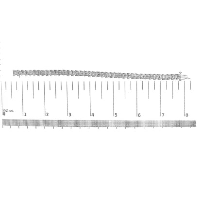 Top-down view of a white metal bracelet with round white gemstones in prong settings, laid flat on a ruler for size reference.