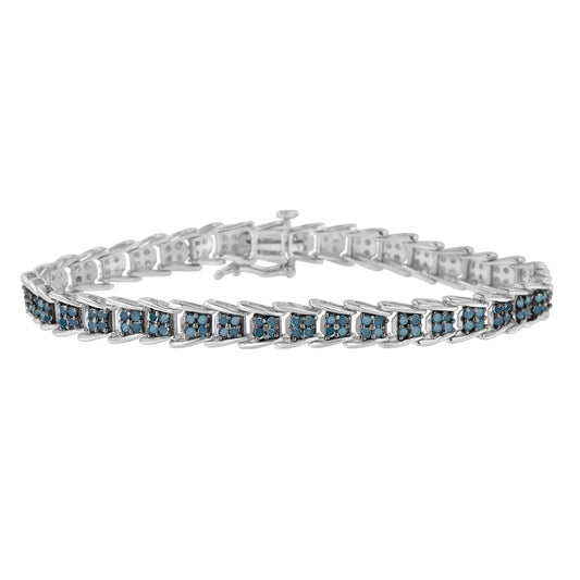 White metal bracelet with multiple linked segments, each set with clusters of round blue gemstones, shown from a front angle.