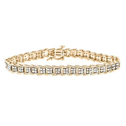 Yellow metal bracelet with white round gemstones in prong settings, angled side view.