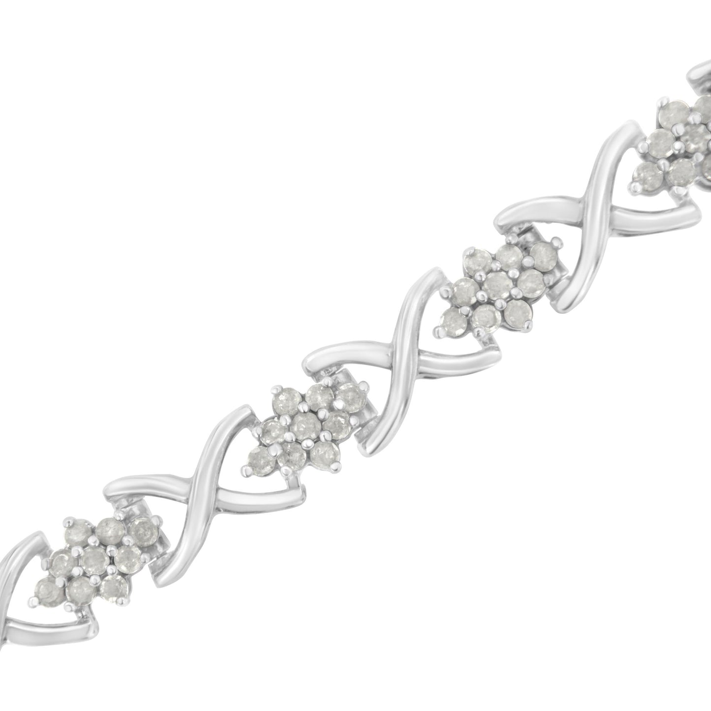 Diagonal close-up of a white metal bracelet featuring clusters of round white gemstones in prong settings alternating with X-shaped links.