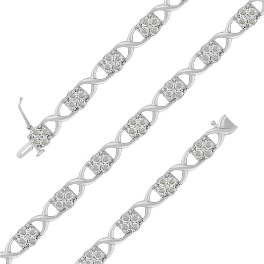 Top-down view of a white bracelet with alternating twisted links and clusters of round white gemstones in prong settings.