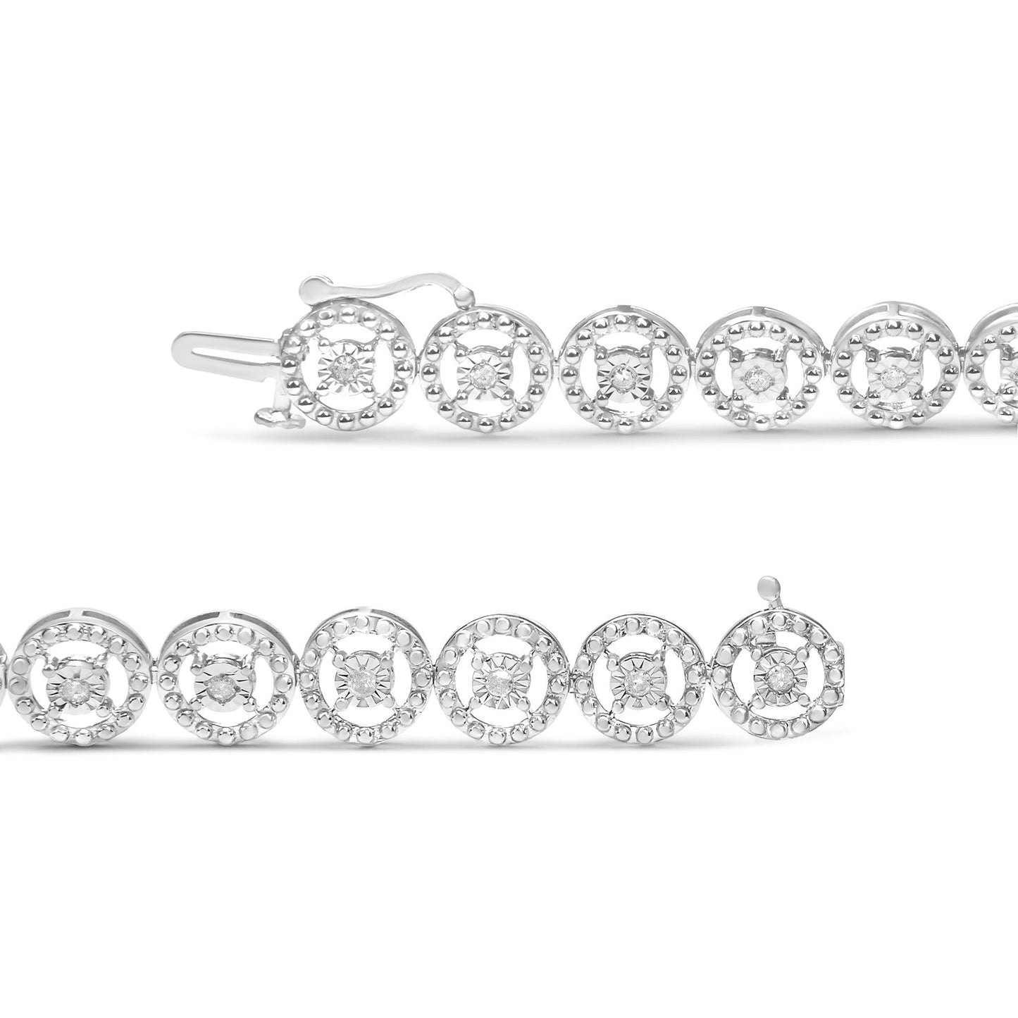 Close-up side angle of a white metal bracelet with round white gemstones set in circular settings along its length.