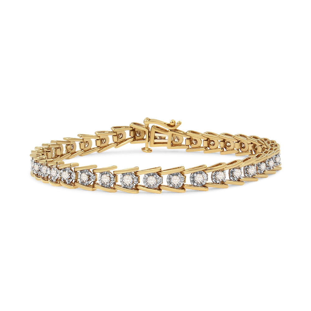 Yellow metal bracelet with round white gemstones in miracle setting, shown in a side angle view.