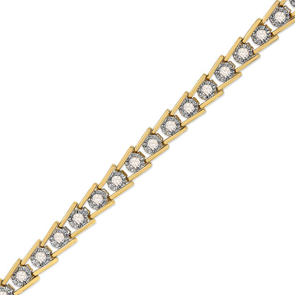 Close-up angled view of a yellow metal bracelet featuring round white gemstones in a miracle setting.