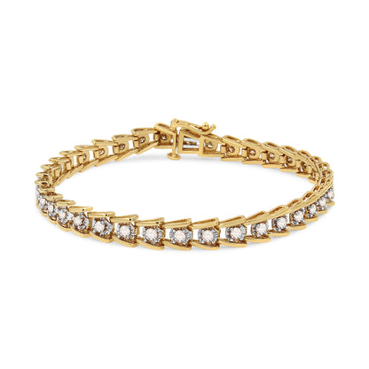 Yellow metal bracelet with round, brownish gemstones in miracle setting, shown at a slight front angle.