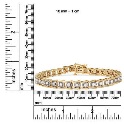 Yellow bracelet with round brownish gemstones in a miracle setting, displayed flat on a ruler for size reference, front angle.