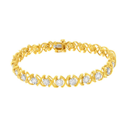 Bracelet with yellow and white metal featuring round white gemstones in prong settings, shown from a front angle on a white background.