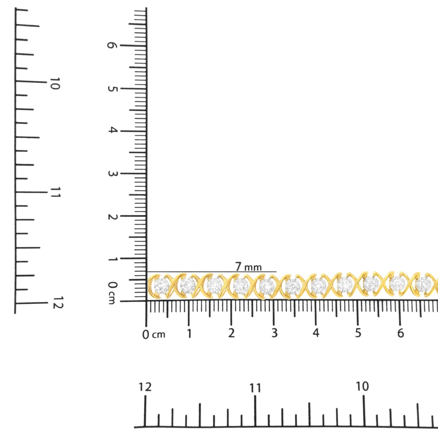 Yellow and white metal bracelet with round white gemstones in prong setting, shown horizontally on a ruler for size reference, top-down angle.