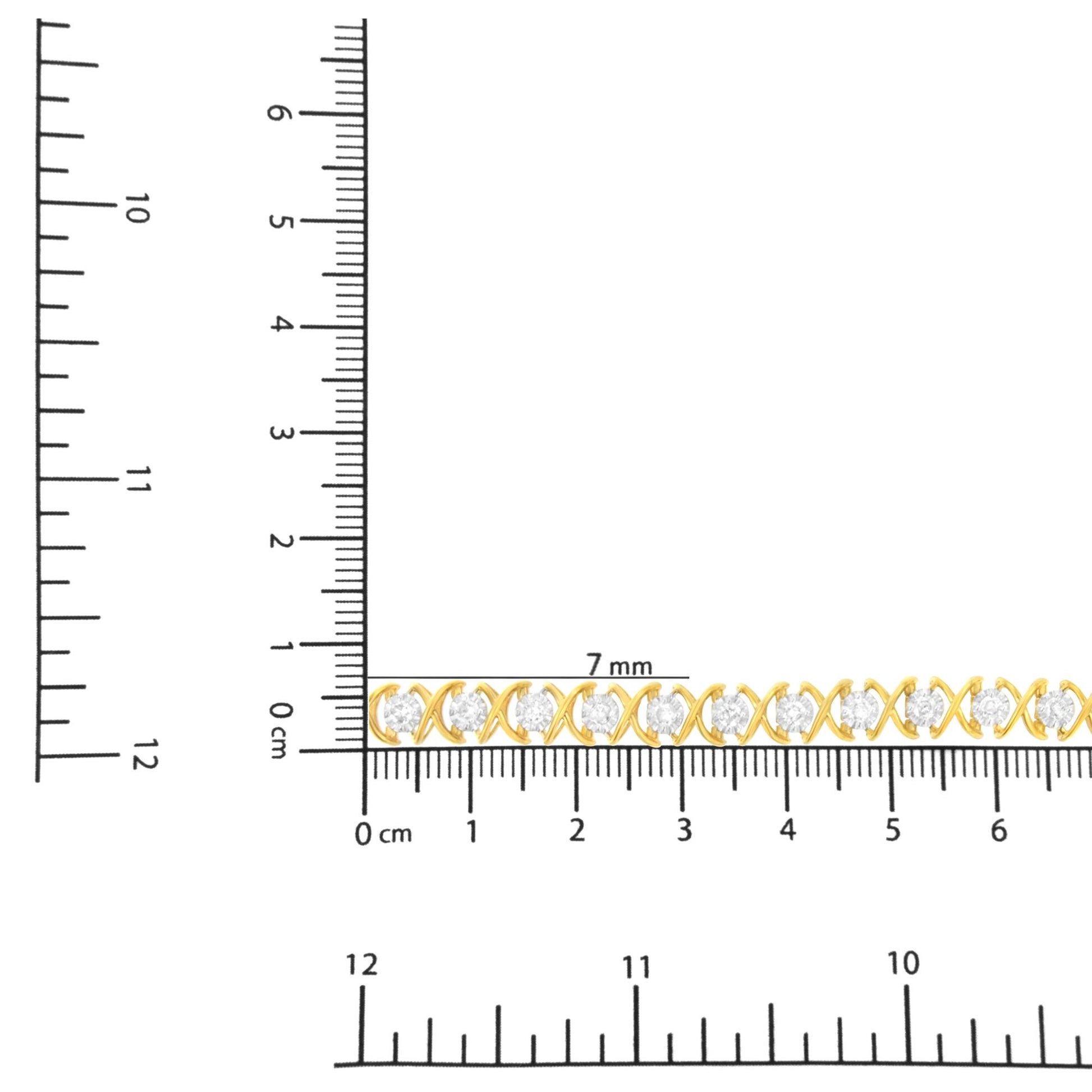 Yellow and white metal bracelet with round white gemstones in prong setting, shown horizontally on a ruler for size reference, top-down angle.