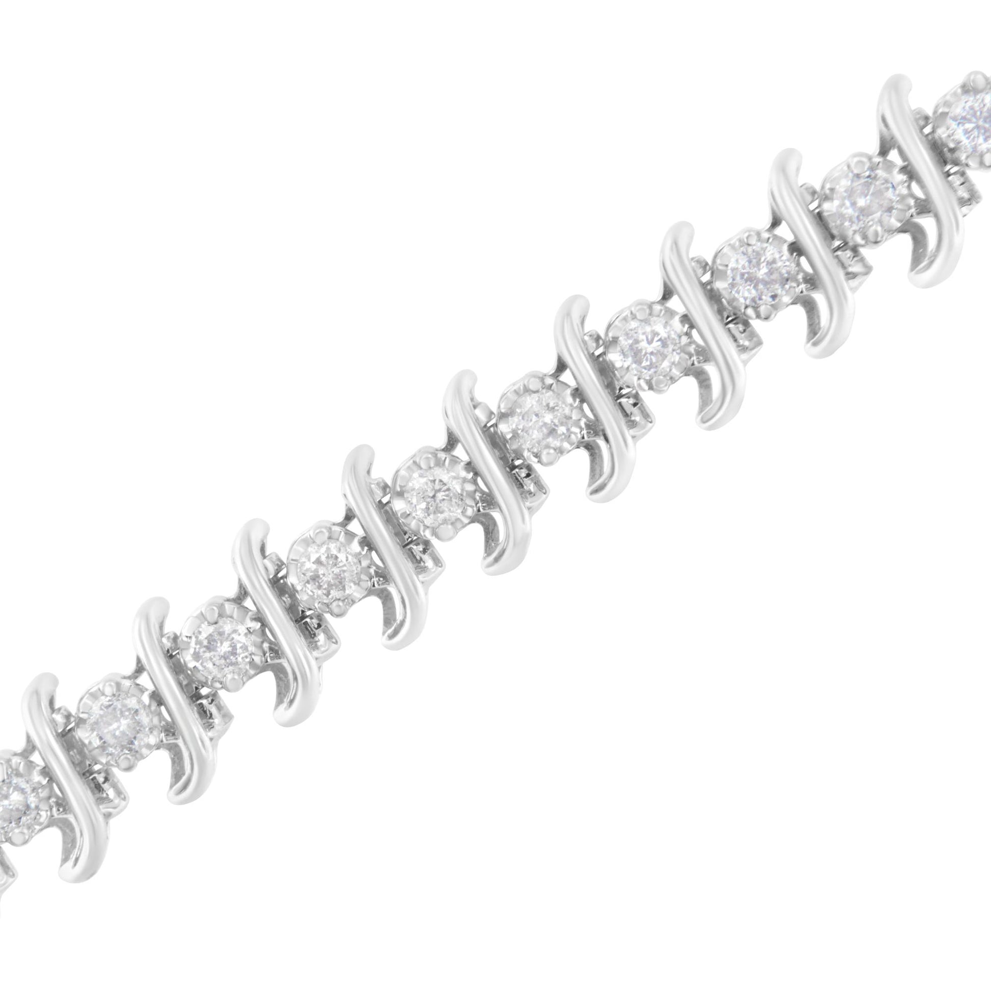 Close-up diagonal view of a white metal bracelet featuring alternating round white gemstones in prong settings.