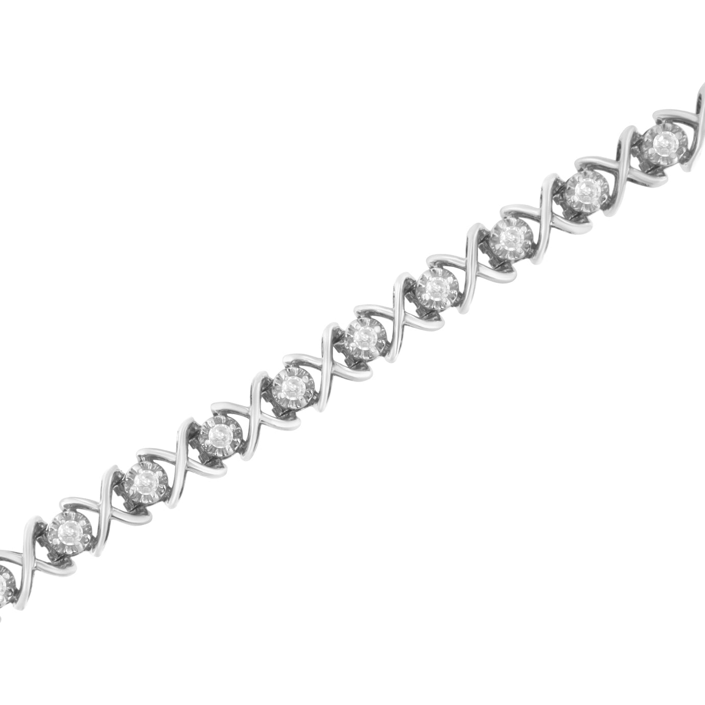 White metal bracelet with round white gemstones in prong settings, shown in a close-up angled view.