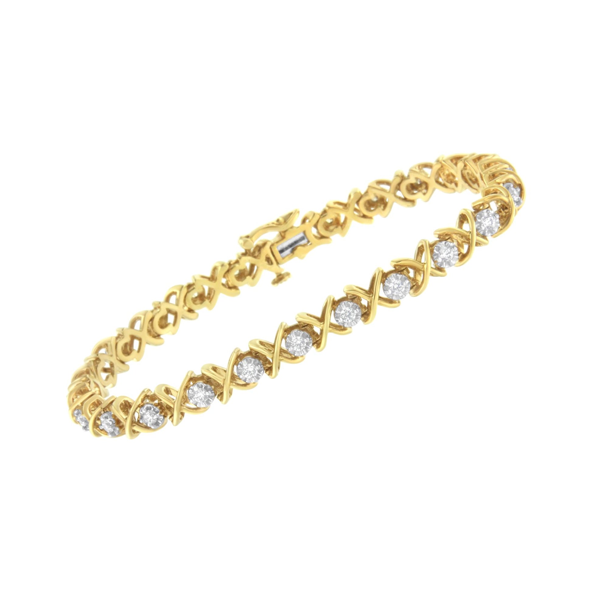 Yellow metal bracelet with round white gemstones in prong settings, shown at an angled top-down view.