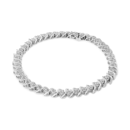 White metal bracelet featuring round white gemstones in a miracle setting, shown in a top-down view.