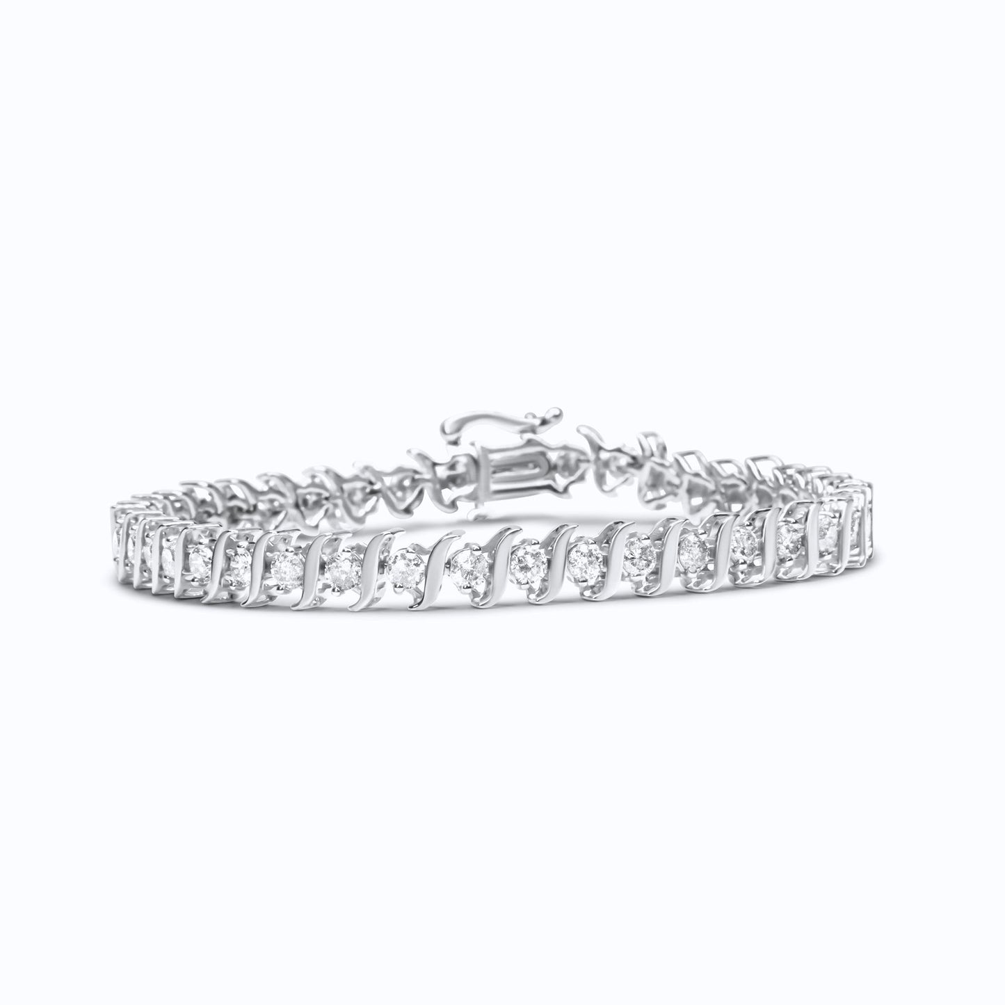 White metal bracelet with round white gemstones in 2-prong settings, shown from a low front angle.