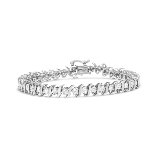 White metal bracelet with round white gemstones in two-prong settings, shown at a slight angle on a white background.
