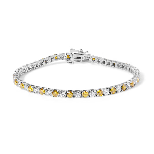 White metal bracelet with alternating round yellow and white gemstones in four-prong settings, shown from a slightly elevated front angle.
