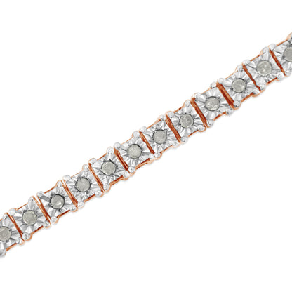 Rose metal bracelet with round white gemstones in miracle settings, shown in a close-up angled view.