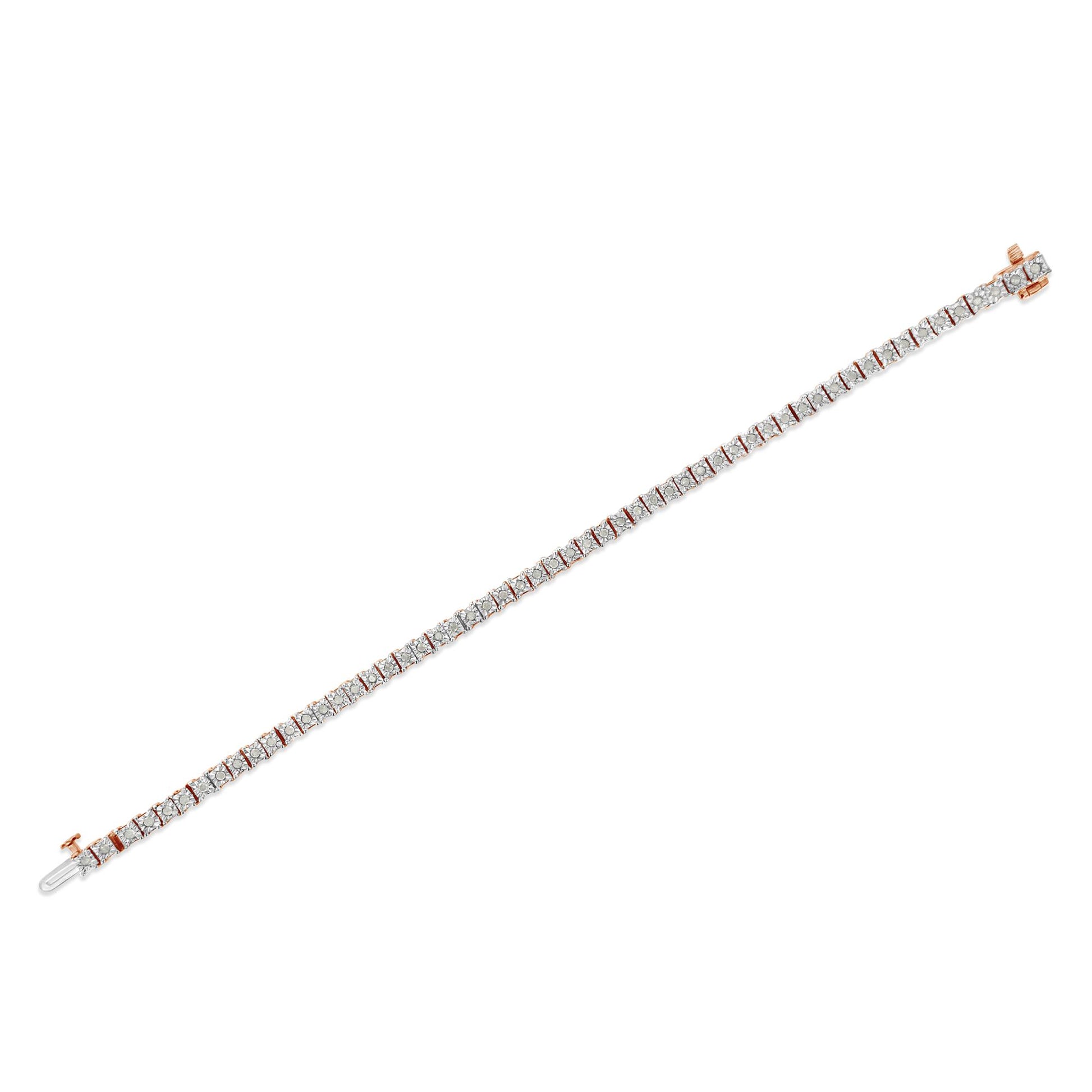 Image of a rose-colored metal bracelet featuring a row of round white gemstones in a miracle setting, shown diagonally from above on a white background.