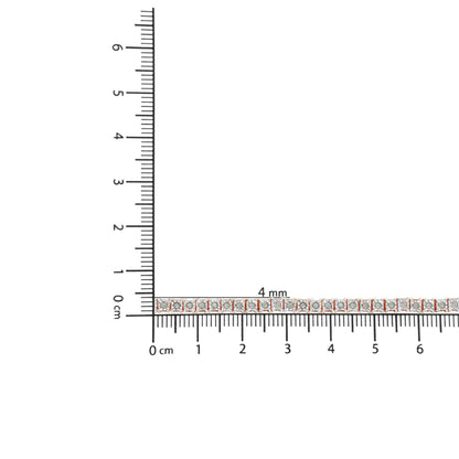 Rose-colored bracelet with round white gemstones in miracle setting, displayed horizontally on a ruler for size reference.