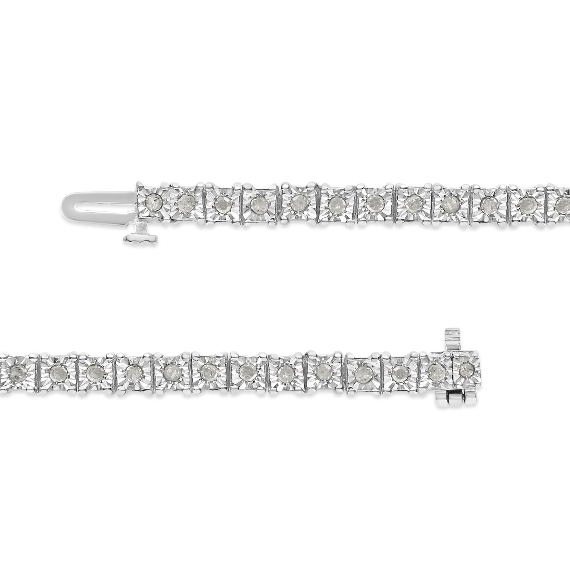 Close-up shot of a white metal bracelet with round white gemstones set in a miracle setting, shown from the top with the clasp visible.