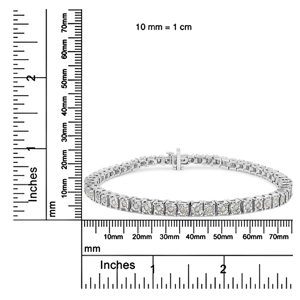 White metal bracelet with round white gemstones in miracle setting, displayed flat on a ruler for size reference, front angled view.