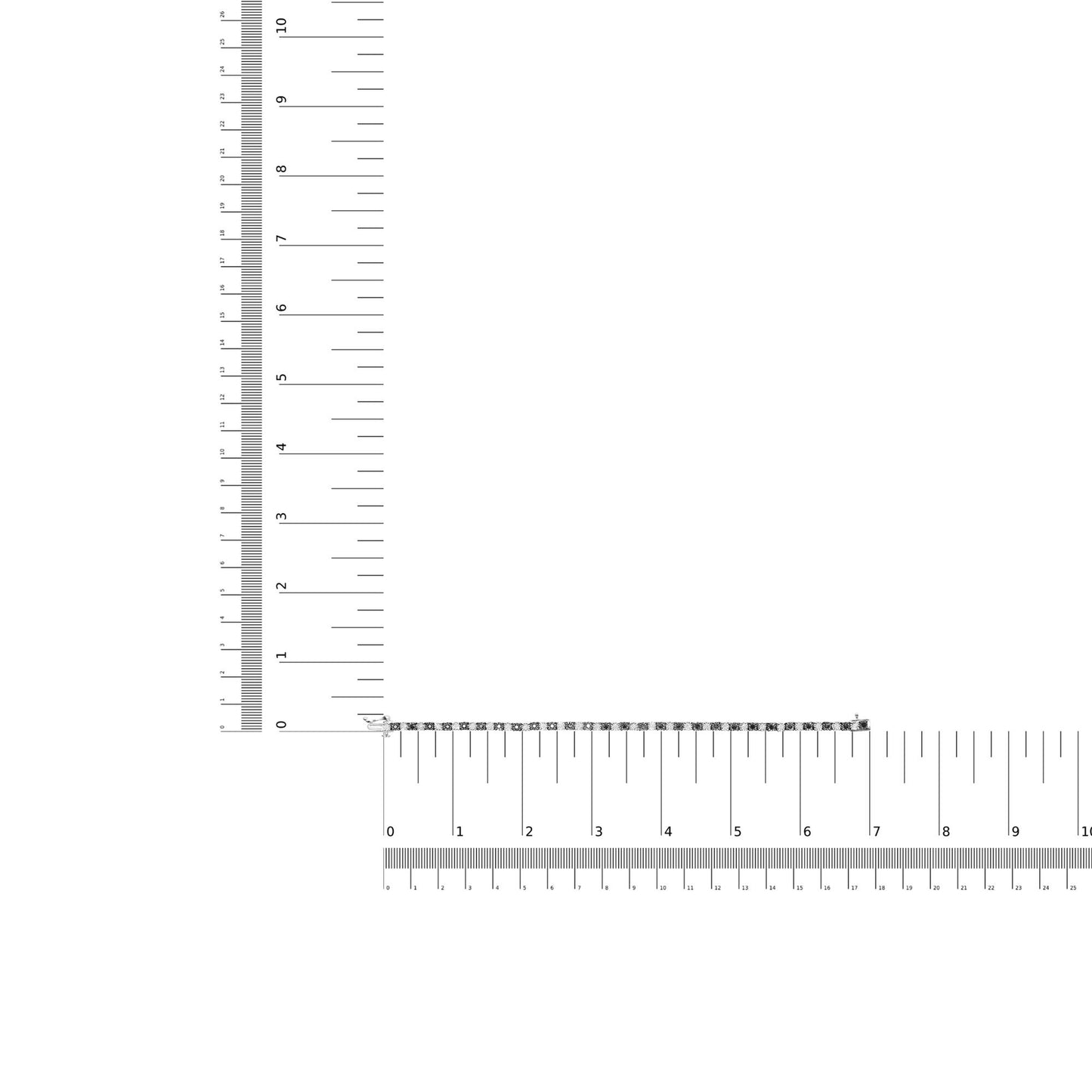 Top-down view of a white metal bracelet with alternating black round and white rose-shaped gemstones in miracle setting, displayed on an L-shaped ruler for size reference.