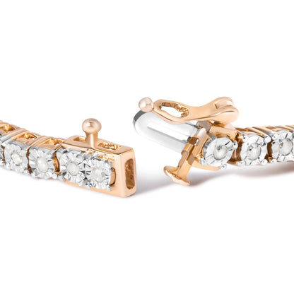 Close-up view of a rose-colored bracelet with round white gemstones in miracle settings, showing the clasp mechanism.