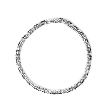 Top-down view of a white metal bracelet featuring alternating blue round gemstones and white rose-shaped gemstones in a continuous pattern with a clasp.