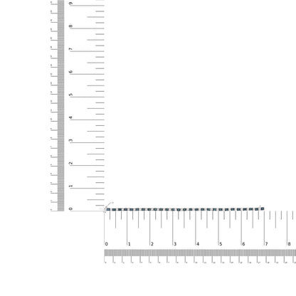 White metal bracelet with alternating blue and white round and rose-shaped gemstones, displayed flat on ruler and scale for size reference, top-down angle.