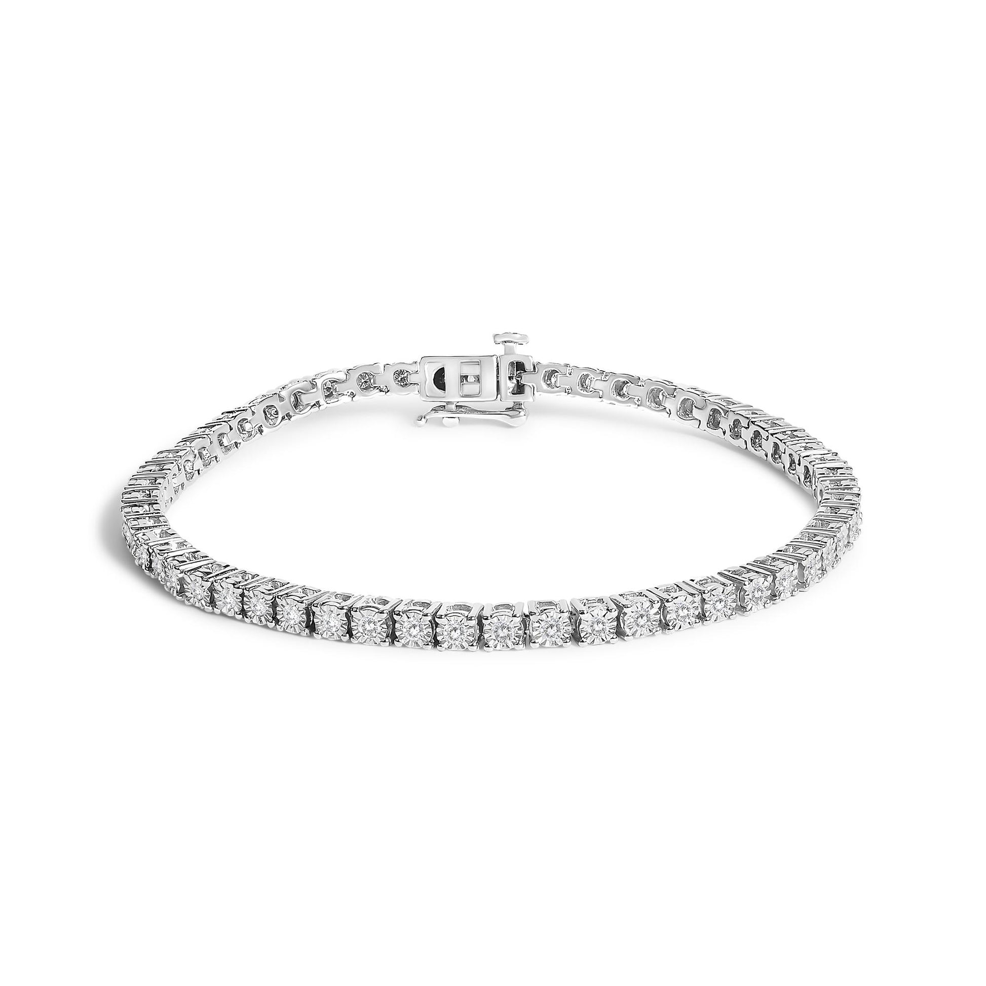 Bracelet with round white gemstones in miracle setting, white metal, shown from a front angle on a white background.