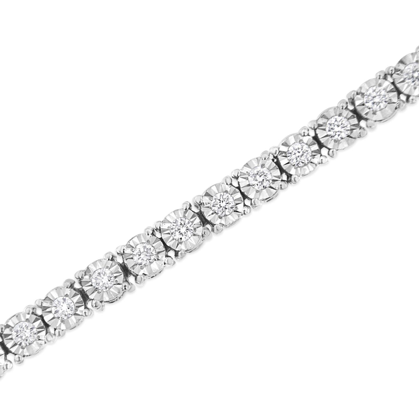 Close-up diagonal view of a white metal bracelet featuring round shaped white gemstones set in a miracle setting.