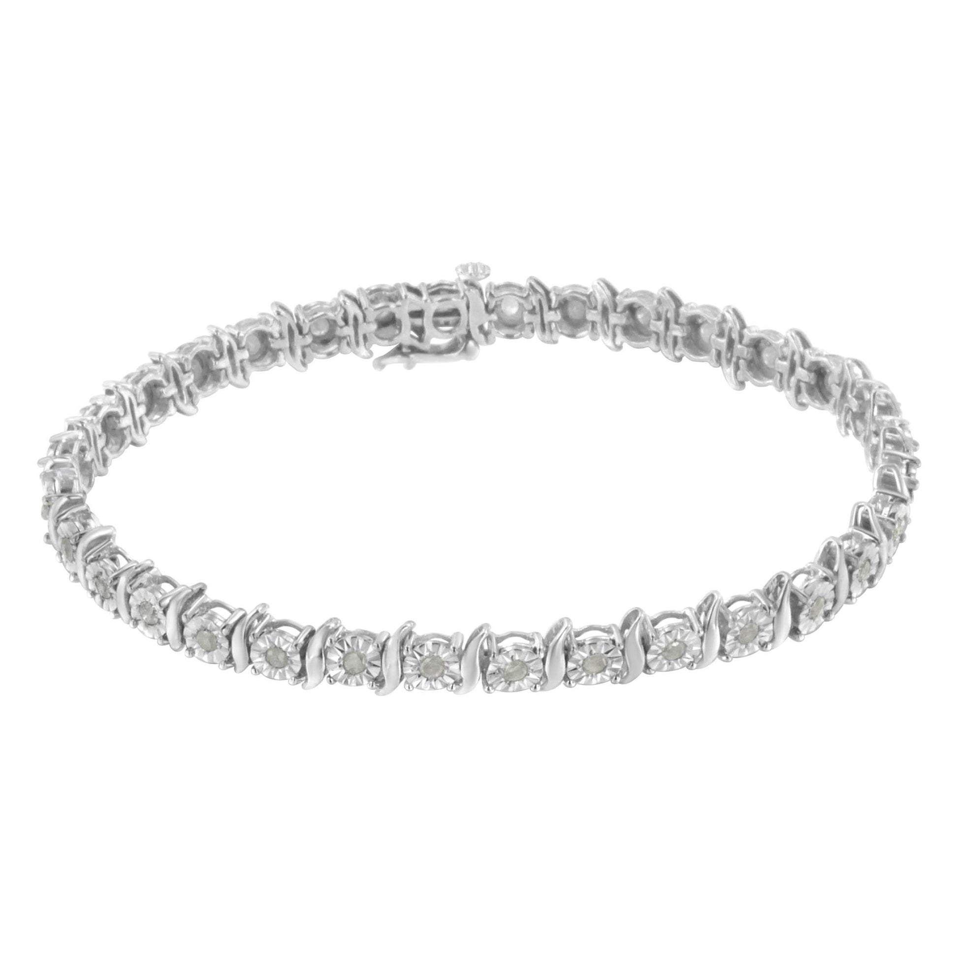 White metal bracelet with round white gemstones in miracle settings, shown from a slightly elevated front angle.