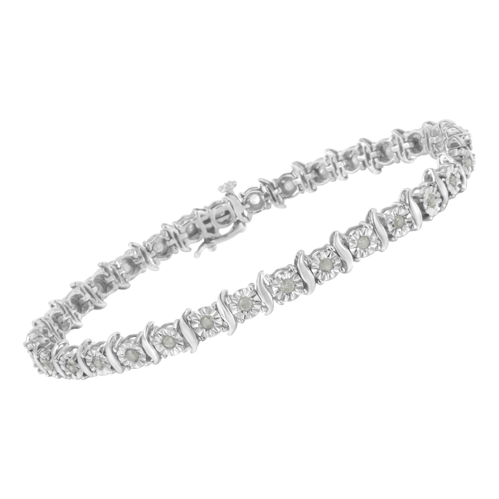 White metal bracelet with round white gemstones in a miracle setting, shown at a slight angle.
