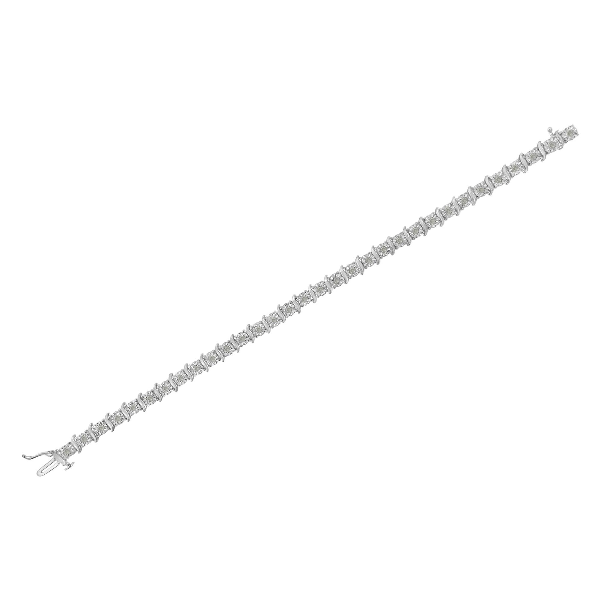 White metal bracelet with round white gemstones in a miracle setting, shown flat against a white background at a slight diagonal angle.