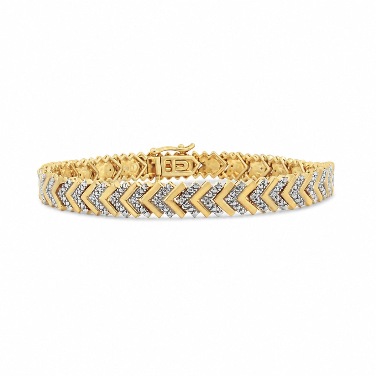 Close-up front angle of a yellow and white metal bracelet with chevron pattern adorned with round white gemstones in prong settings, shown on a white background.