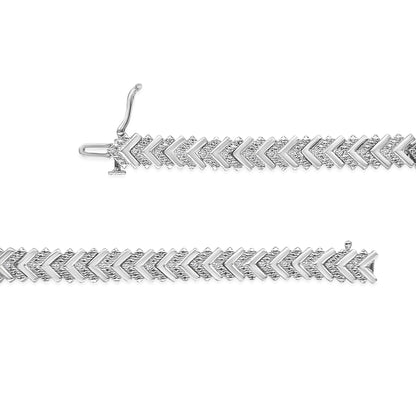 White metal bracelet with alternating chevron links, each set with round white gemstones, shown in a horizontal top-down view.