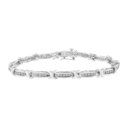 White metal bracelet with linked sections featuring round white gemstones in channel settings, side angle view.