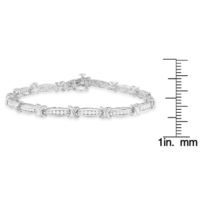 White metal bracelet with alternating links featuring channel-set round white gemstones, displayed flat with a size ruler for reference.