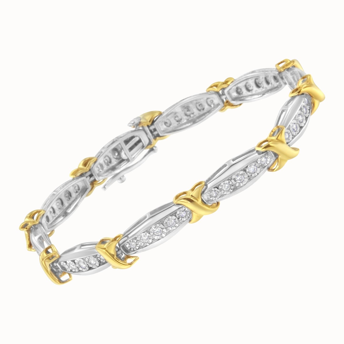 Bracelet with alternating yellow and white metal links, each white link set with round white gemstones, shown at an angled top view.