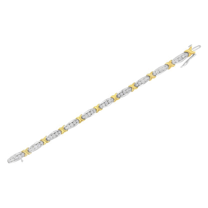 Diagonal top-down view of a bracelet featuring alternating yellow and white sections, with white round gemstones set in the white parts.