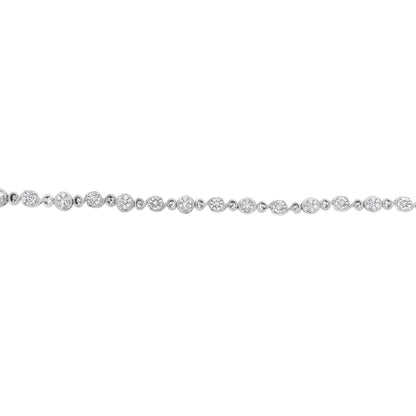 Close-up front view of a white metal bracelet featuring alternating round-shaped white gemstones in prong and miracle settings.
